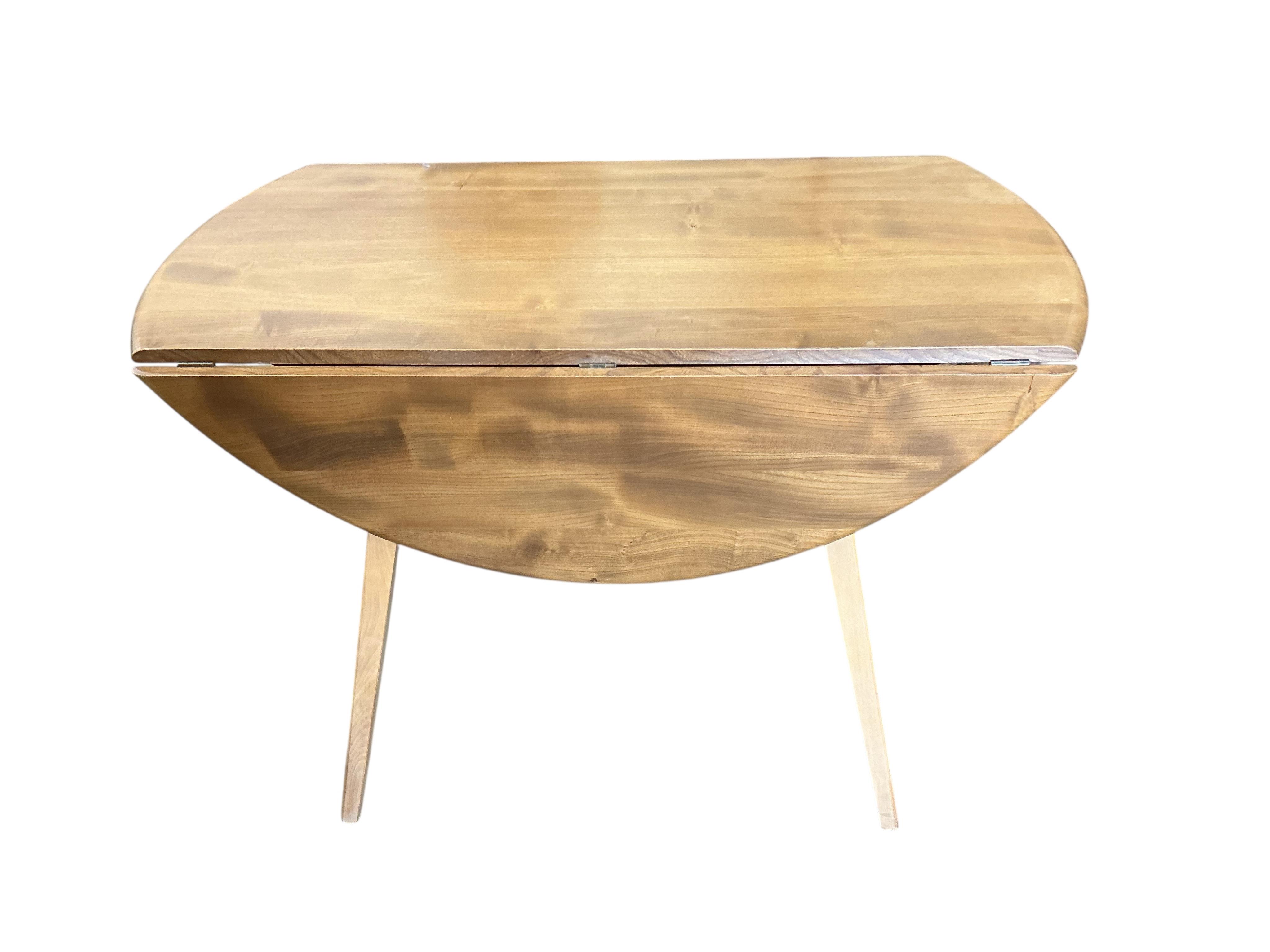 An Ercol light elm drop leaf dining table, width 112cm, depth 64cm, height 72cm